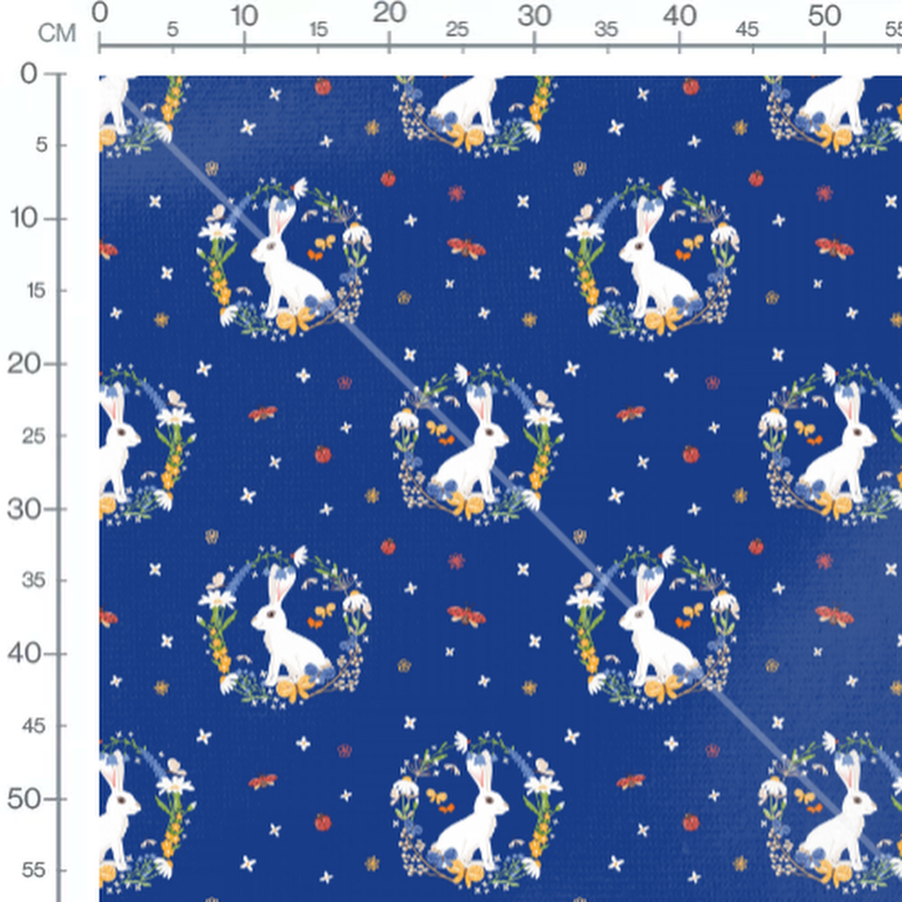 Tissu - Lapins et fleurs sur bleu