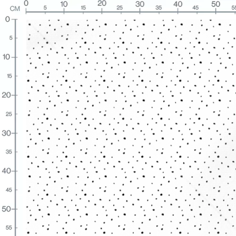 Tissu - Pois noirs dynamiques sur blanc