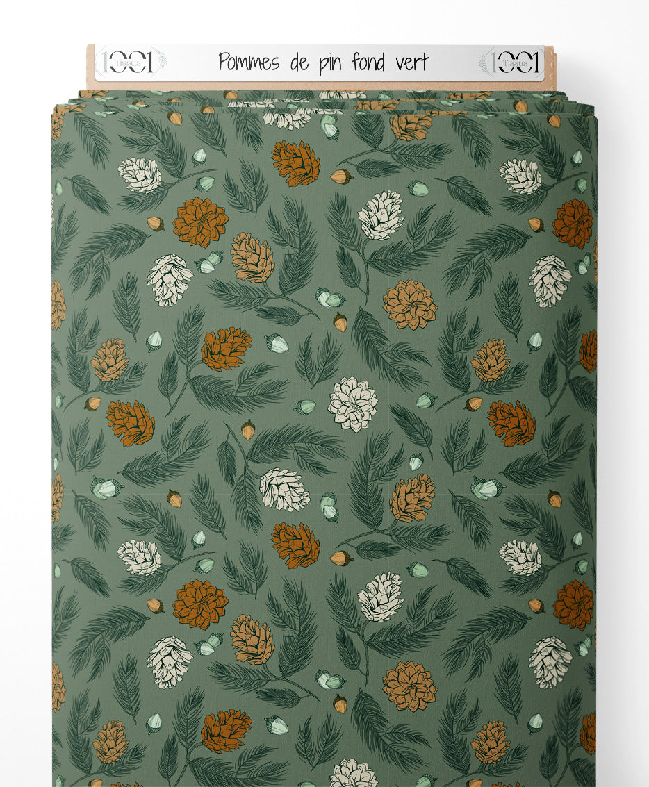 Tissu - Pommes de pin sur fond vert