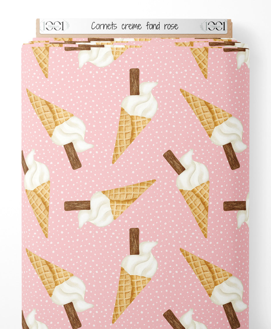 Tissu - Cornets crème sur fond rose
