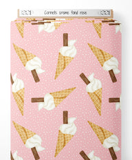 Tissu - Cornets crème sur fond rose