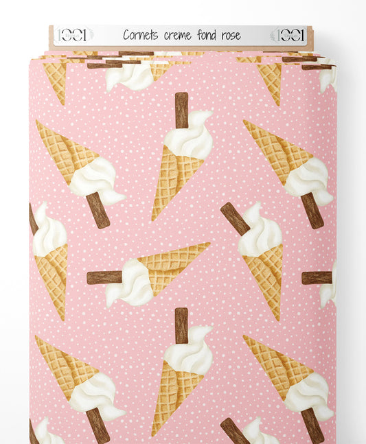 Tissu - Cornets crème sur fond rose