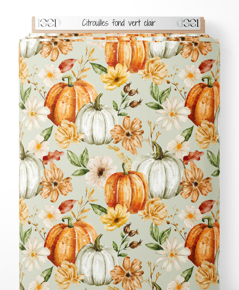 Tissu - Citrouilles sur fond vert clair