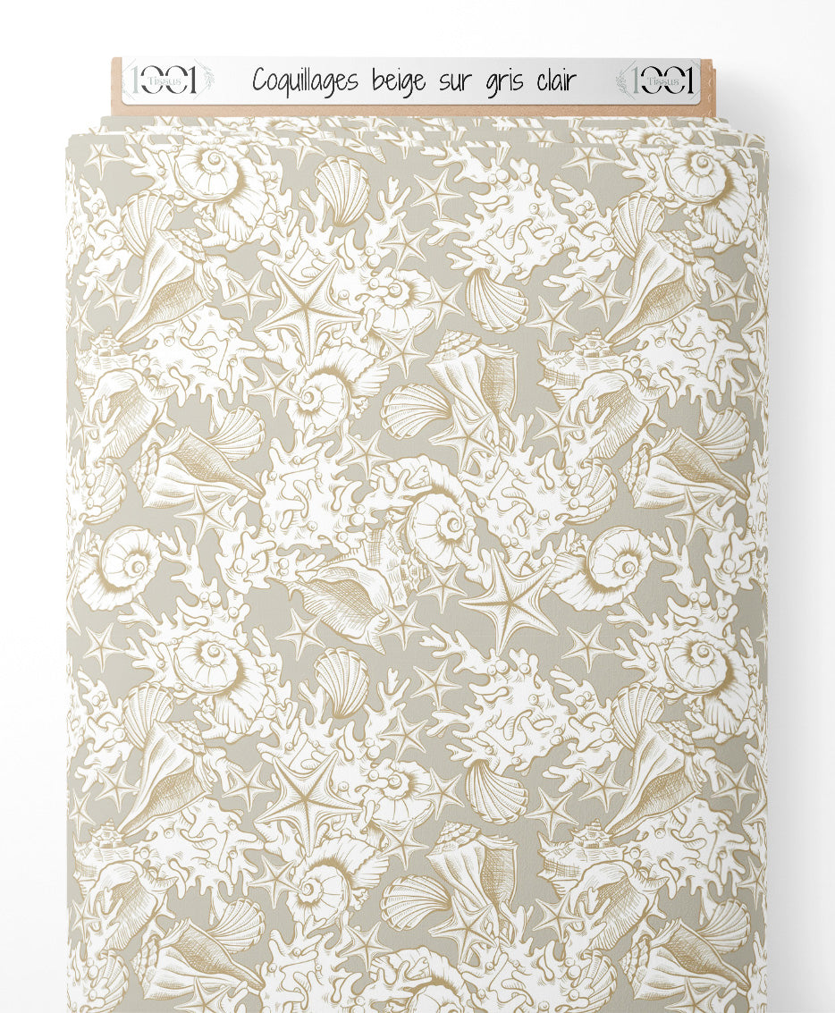 Tissu - Coquillages beige sur gris clair