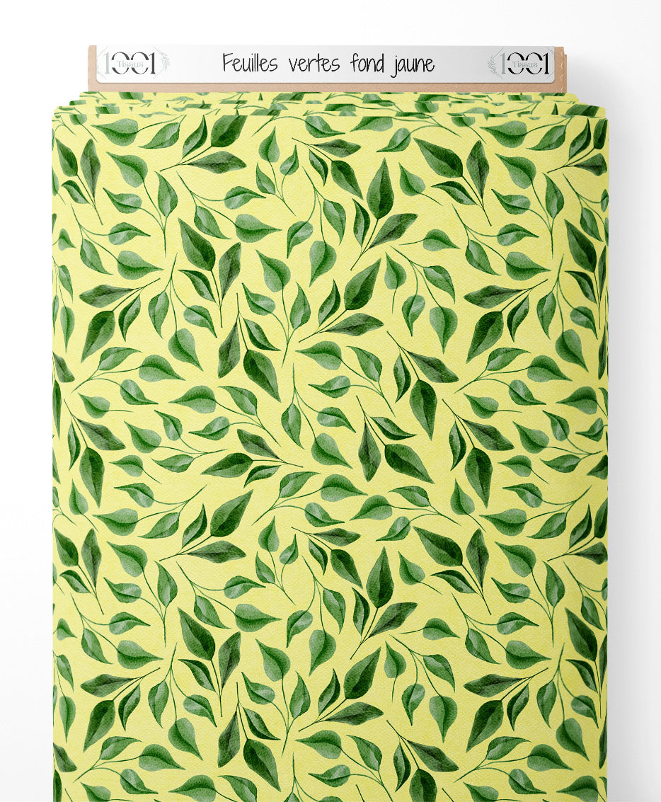 Tissu - Feuilles vertes sur fond jaune