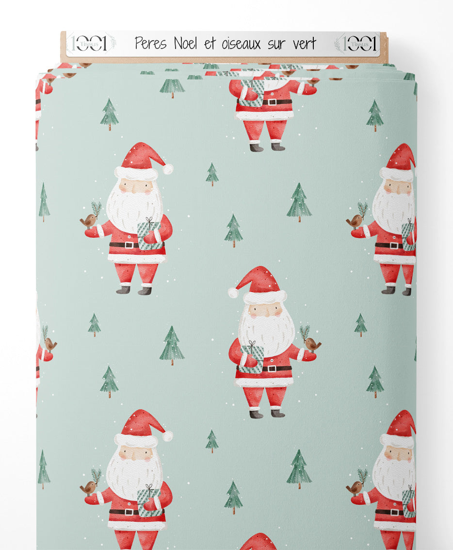 Tissu - Pères Noël et oiseaux sur vert