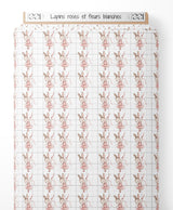 Tissu - Lapins roses et fleurs blanches