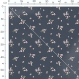 Tissu - Fleurs violettes sur fond bleu