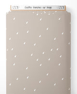 Tissu - Gouttes blanches sur beige
