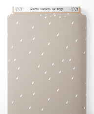 Tissu - Gouttes blanches sur beige