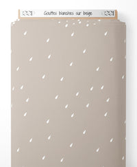 Tissu - Gouttes blanches sur beige