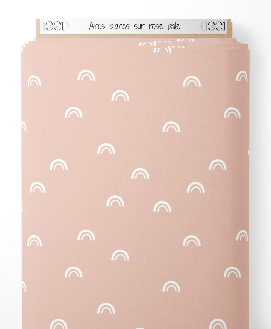 Tissu - Arcs blancs sur rose pâle