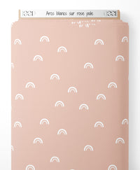 Tissu - Arcs blancs sur rose pâle