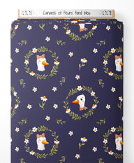 Tissu - Canards et fleurs sur fond bleu