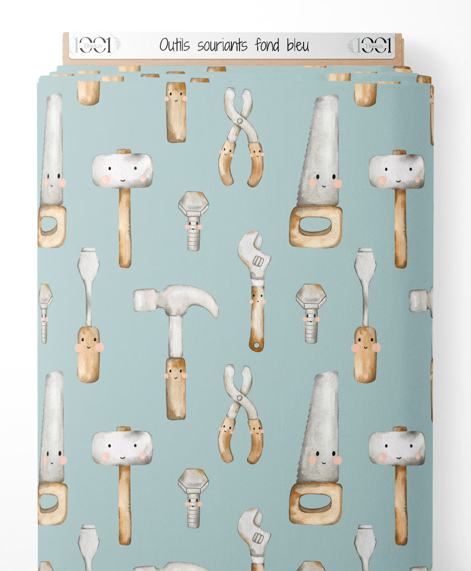 Tissu - Outils souriants sur fond bleu