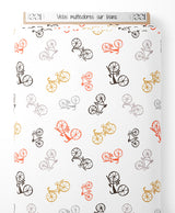 Tissu - Vélos multicolores sur blanc