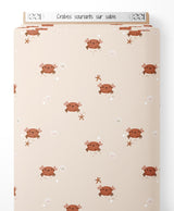 Tissu - Crabes souriants sur sable