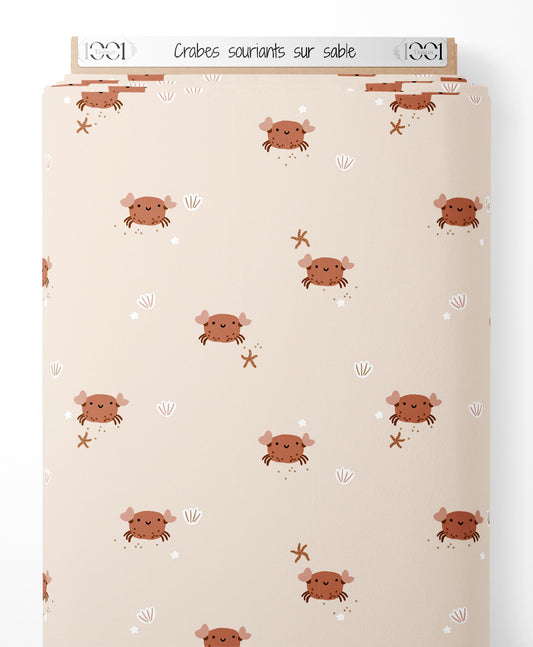 Tissu - Crabes souriants sur sable