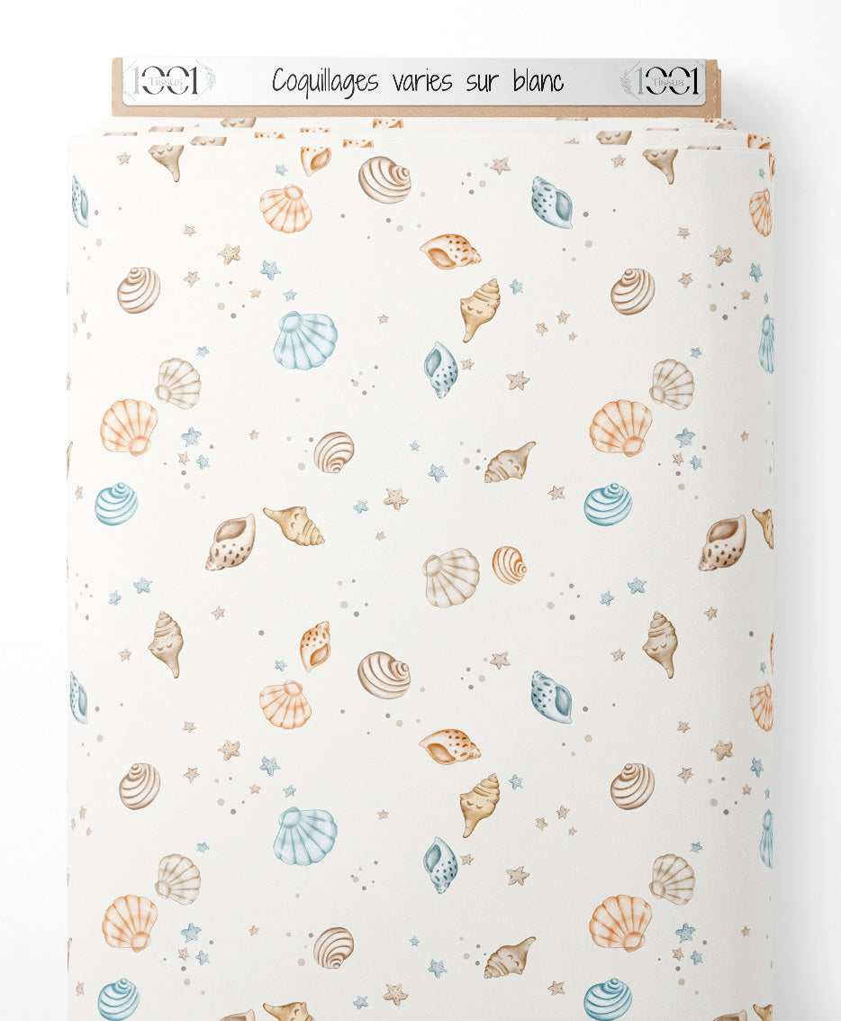 Tissu - Coquillages variés sur blanc