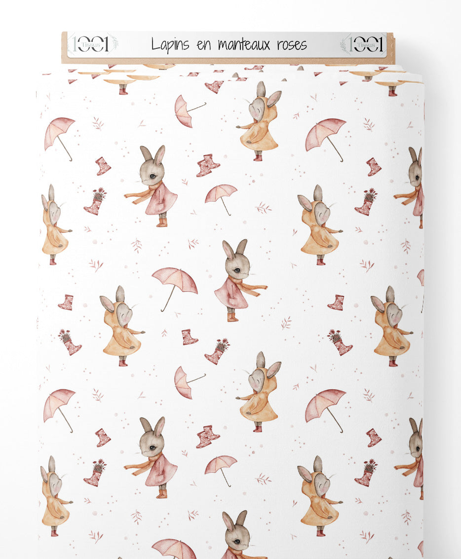 Tissu - Lapins en manteaux roses