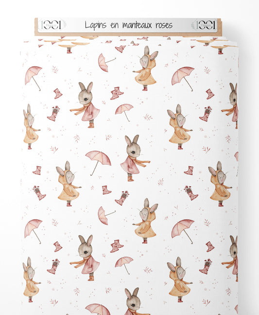 Tissu - Lapins en manteaux roses