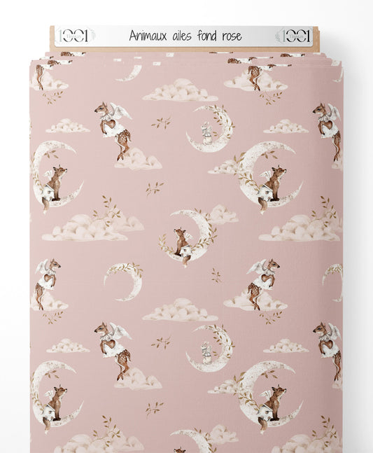 Tissu - Animaux ailés sur fond rose