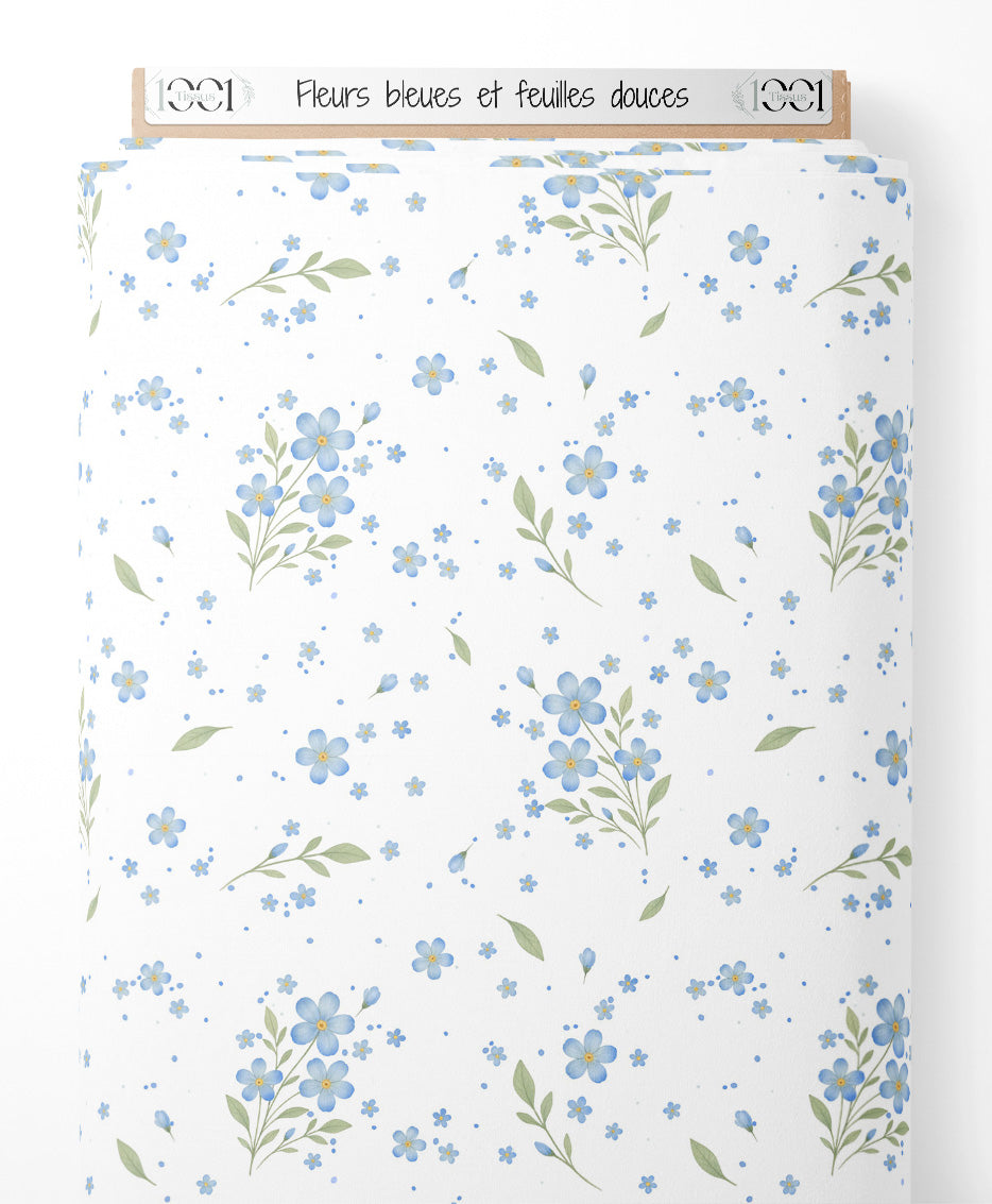 Tissu - Fleurs bleues et feuilles douces