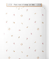 Tissu - Fleurs roses et orange sur blanc