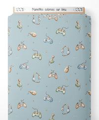 Tissu - Manettes colorées sur bleu