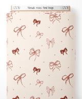 Tissu - Nœuds roses sur fond beige