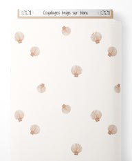 Tissu - Coquillages beige sur blanc