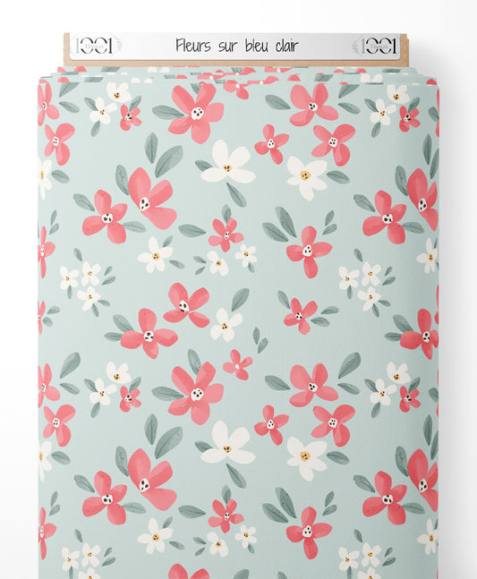 Tissu - Fleurs sur bleu clair