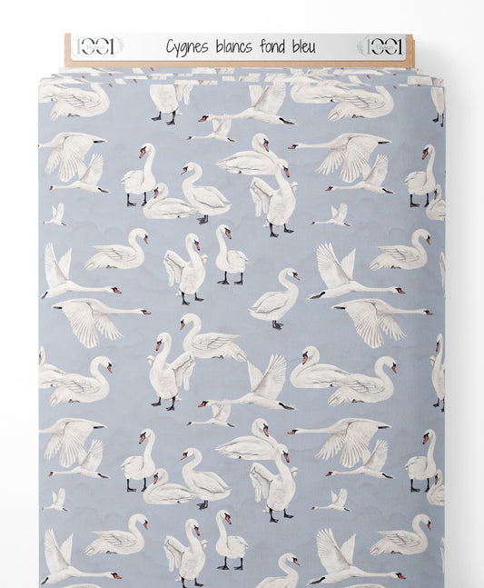 Tissu - Cygnes blancs sur fond bleu