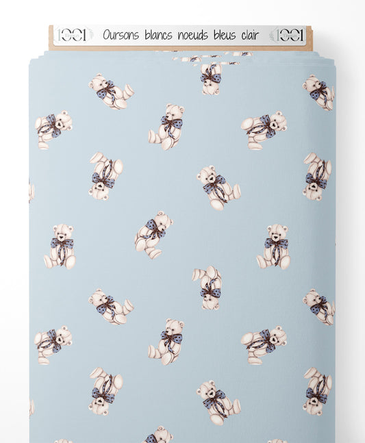 Tissu - Oursons blancs nœuds bleus clair