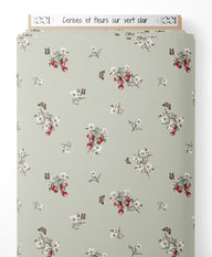 Tissu - Cerises et fleurs sur vert clair
