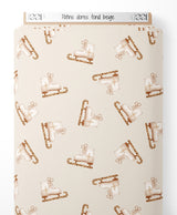 Tissu - Patins dorés sur fond beige