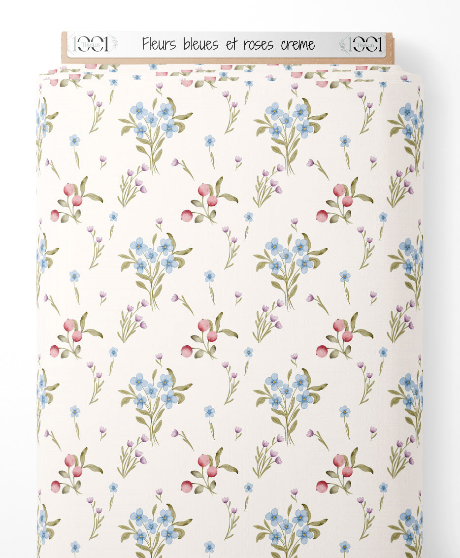 Tissu - Fleurs bleues et roses crème