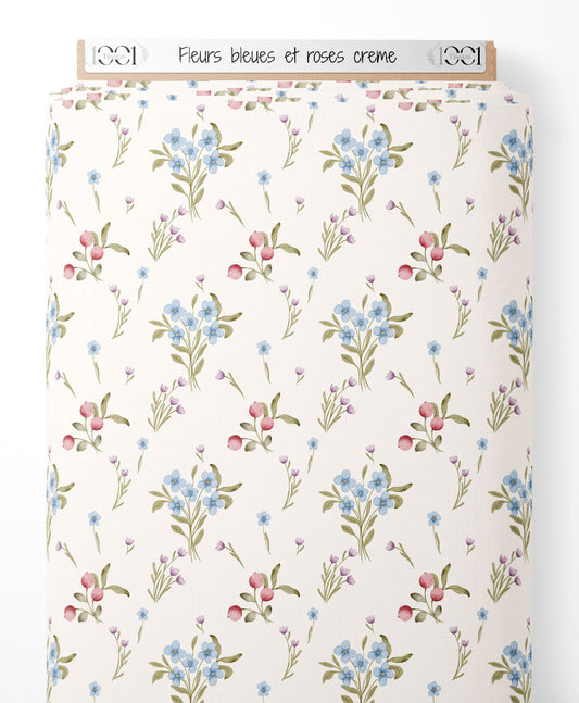 Tissu - Fleurs bleues et roses crème