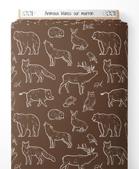 Tissu - Animaux blancs sur marron