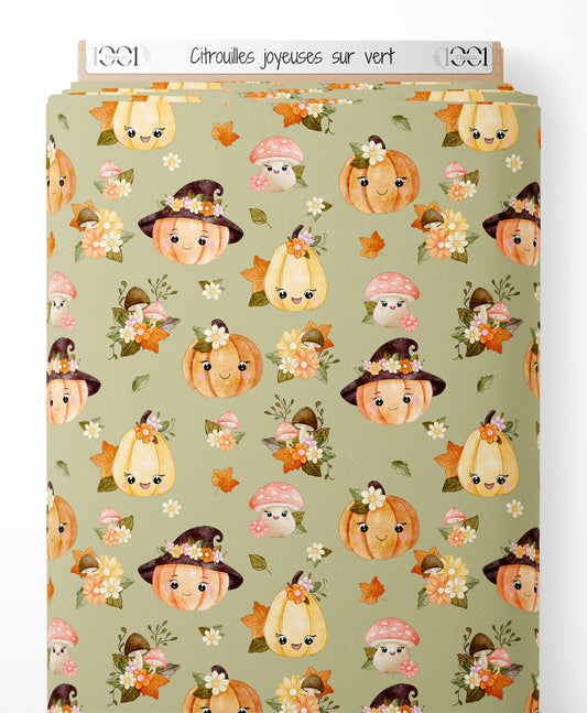 Tissu - Citrouilles joyeuses sur vert