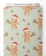 Tissu - Bonhommes Noël sur vert clair