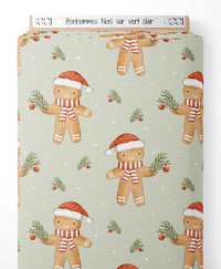 Tissu - Bonhommes Noël sur vert clair