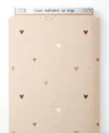 Tissu - Cœurs multicolores sur beige