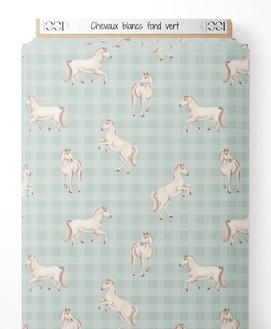 Tissu - Chevaux blancs sur fond vert