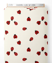 Tissu - Coccinelles à pois sur crème