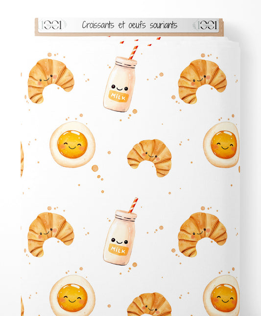 Tissu - Croissants et œufs souriants