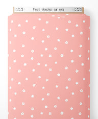 Tissu - Fleurs blanches sur rose