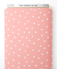 Tissu - Fleurs blanches sur rose