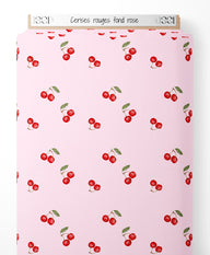 Tissu - Cerises rouges sur fond rose