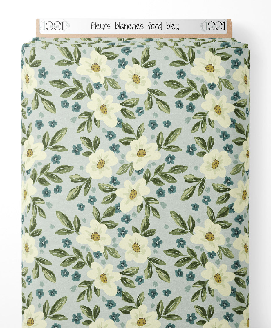Tissu - Fleurs blanches sur fond bleu